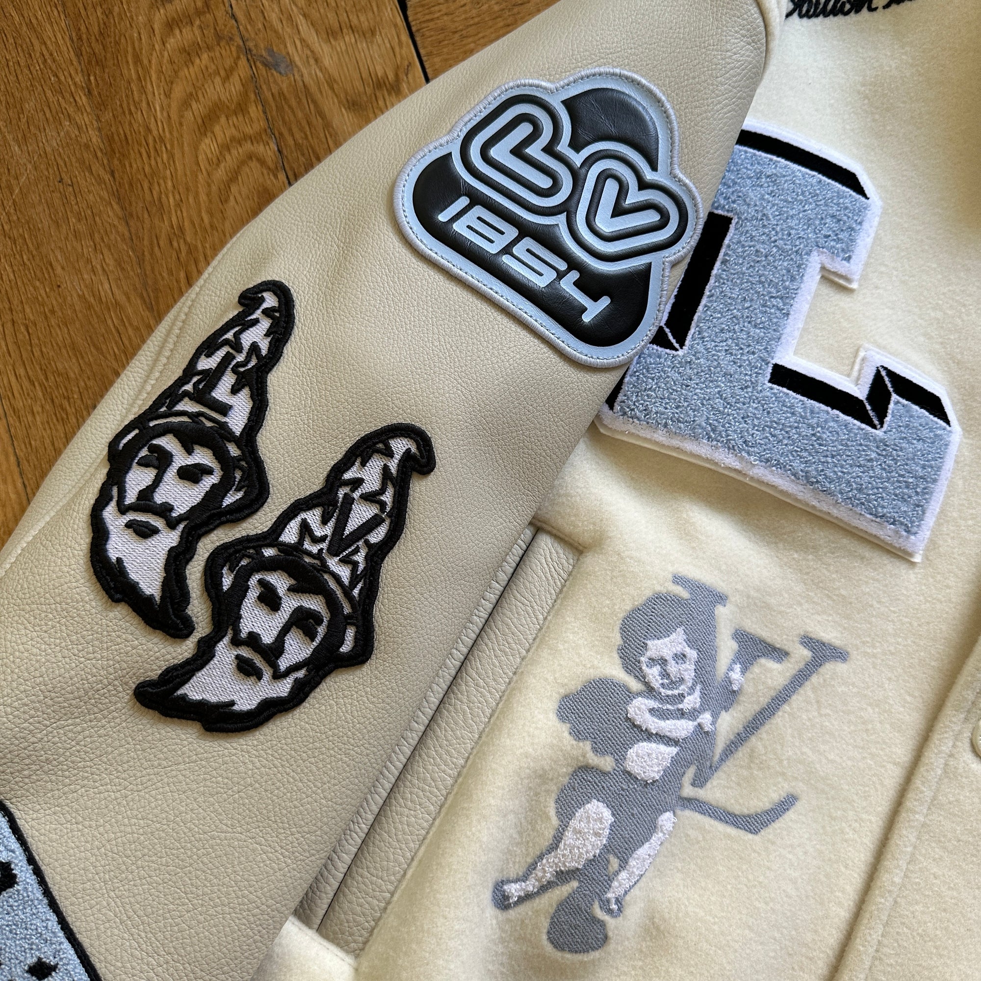 Louis Vuitton FW22 Cream Patched Bunny Varsity Jacket