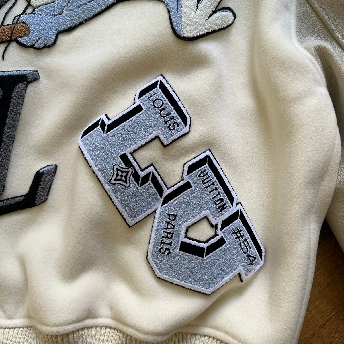 Louis Vuitton FW22 Cream Patched Bunny Varsity Jacket