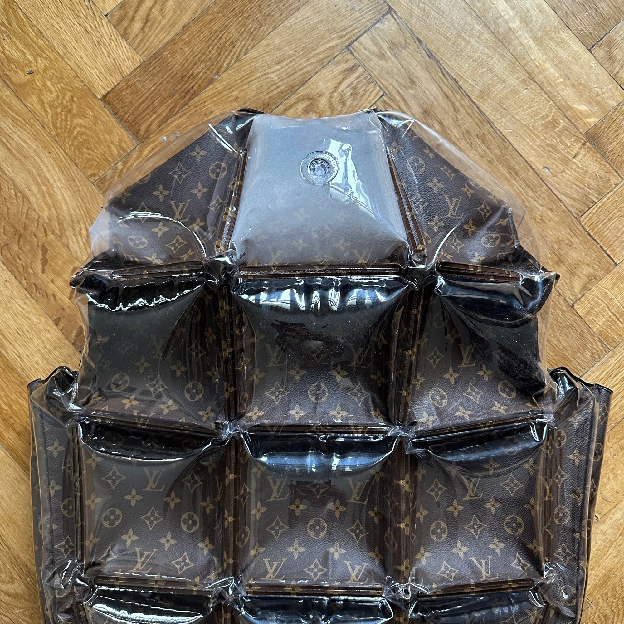 Louis Vuitton's SS21 collection Make Inflatable vests Cool