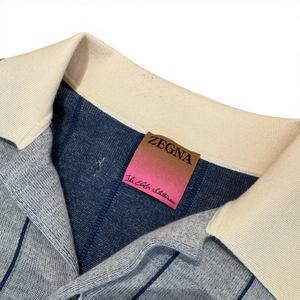 Ākaibu Store blue and grey striped cashmere knit polo shirt with a cream collar and Zegna label.