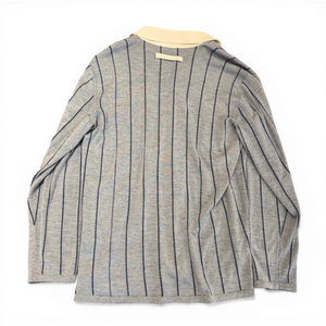 Ākaibu Store light blue cashmere long sleeve polo shirt with navy vertical stripes and cream collar.