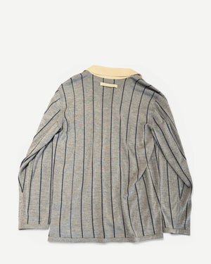 Ākaibu Store light blue cashmere long sleeve polo shirt with navy vertical stripes and cream collar.