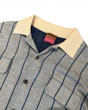 Ākaibu Store light blue and navy striped cashmere knit shirt with cream collar and two chest pockets.