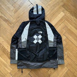 The north top face backpack jacket